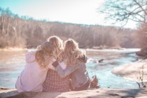 women by lake